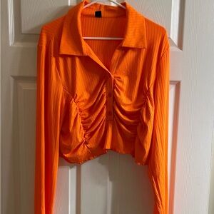 3/$10 She-in Curve Orange cropped top with long sleeves.  Really cute hem!  EUC